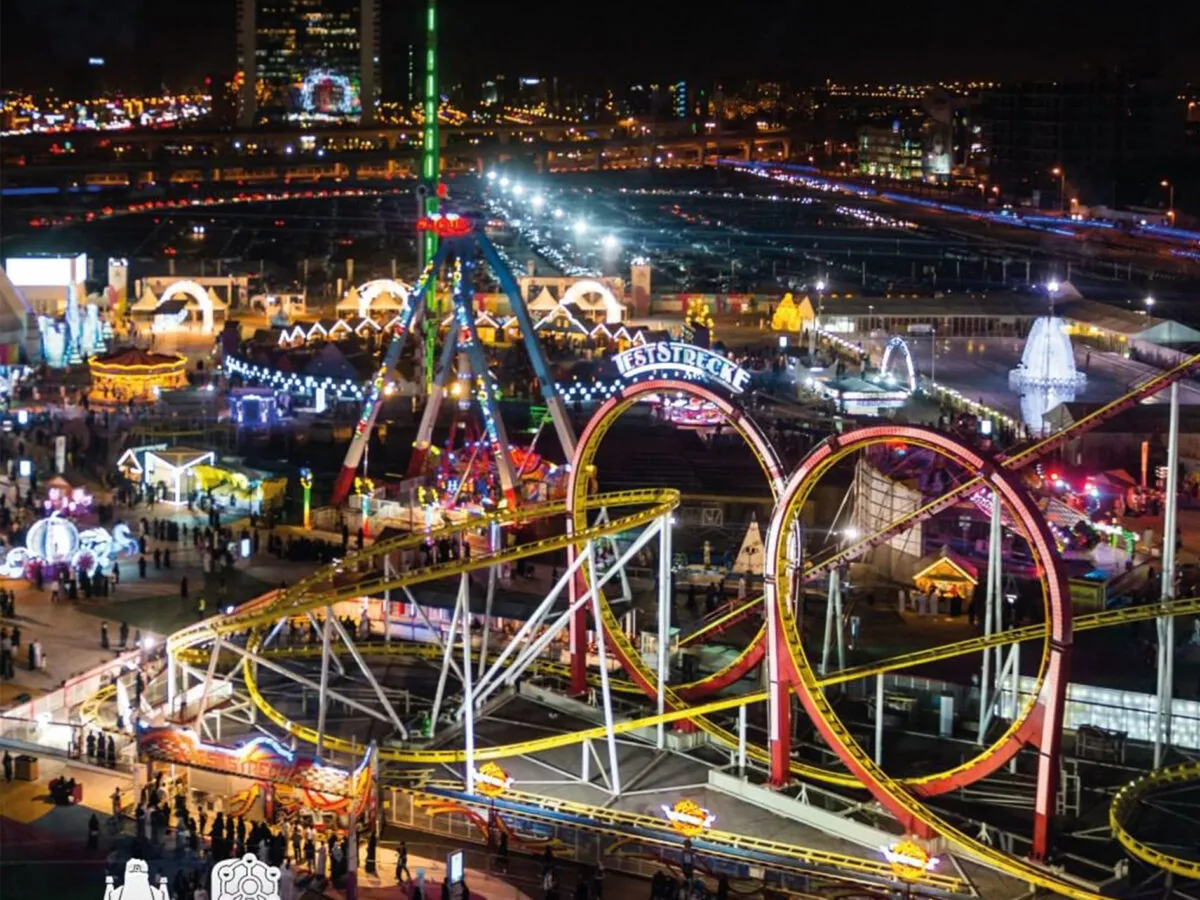 Night amusement park and rollercoaster