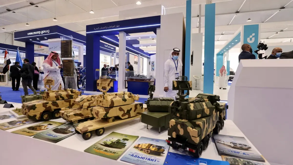 Exhibition stand with military vehicle models
